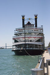 Detroit Princess docked in the Michigan River with the Ambassador Bridge to Windsor, Ontartio in the background