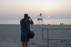 Tom photographing sunset in Grand Bend, Ontario